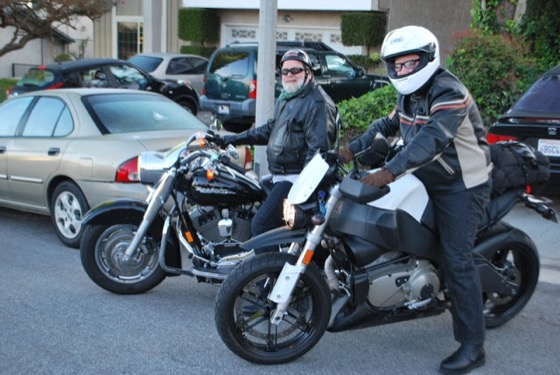 Jonathan on the Buell and his dad on a Harley-Davidson, ready to ride, in California