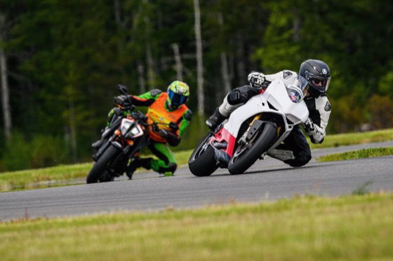 Jonathan on the Panigale with his mentor Garrick following on a KTM Super Duke