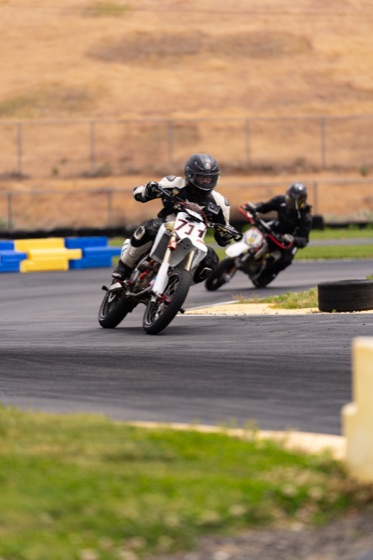 Jonathan Spiva on the Honda CRF150R #711 through a corner (photo 14 of 77)