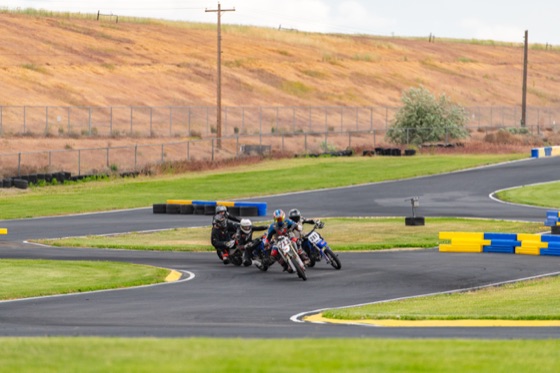 Riders bunched into the first corner after the restart (photo 45 of 77)