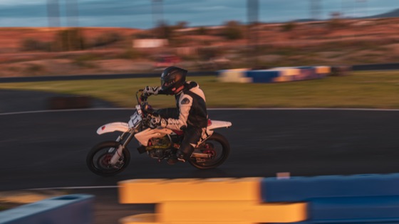 Panning shot of Jonathan Spiva on the #711 at dusk (photo 65 of 77)