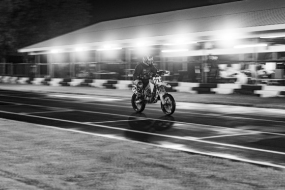 Black and white: the #711 past the pit canopy at night (photo 72 of 77)