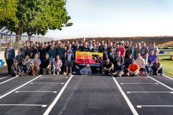 Riders and crews on the start-finish straight for the NorthWest Mini Moto 24-hour group photo (photo 1 of 117)