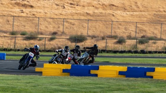 The #711 in traffic below the dry hillside (photo 17 of 117)