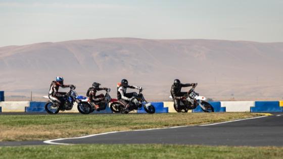 A line of riders through a corner, the #711 among them (photo 19 of 117)