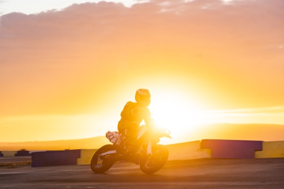 The #711 and its rider backlit by the setting sun (photo 56 of 117)