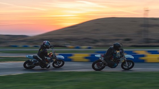 Hannah Johnson on the #711 and the #15 at sunrise with the hills behind (photo 84 of 117)