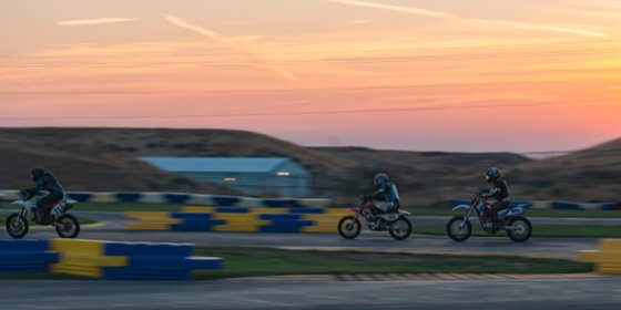 Riders spread along the track at sunrise (photo 85 of 117)