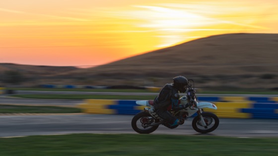Hannah Johnson on the #711 alone against a yellow sunrise (photo 98 of 117)