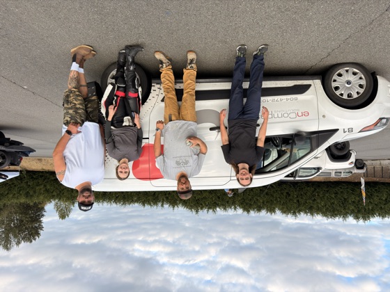 Team Encompass beside their van in the paddock at Vancouver Island Motorsport Circuit