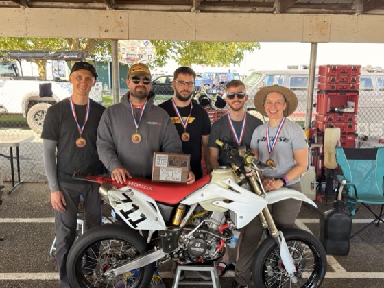The Spiva Racing Team with their medals, the third place plaque and the Honda CRF150R #711 at TCKC (photo 1 of 1)
