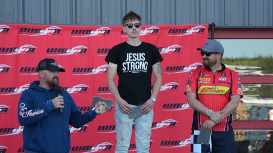 Jonathan Spiva on the Round 4 podium