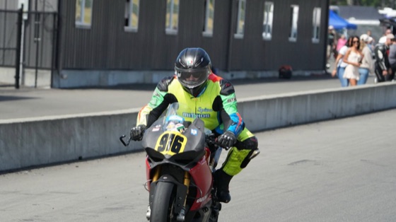 Jonathan Spiva riding the #916 Ducati Panigale R out of the Ridge pit lane