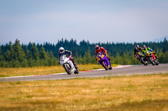 Riders strung out across the track at The Ridge, Jonathan Spiva among them