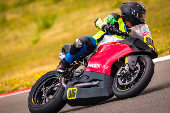 Jonathan Spiva (#916) leaned over on the Ducati Corse Panigale R at The Ridge