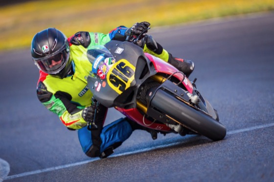 Jonathan Spiva (#916) knee down on the Ducati Panigale R at Portland International Raceway