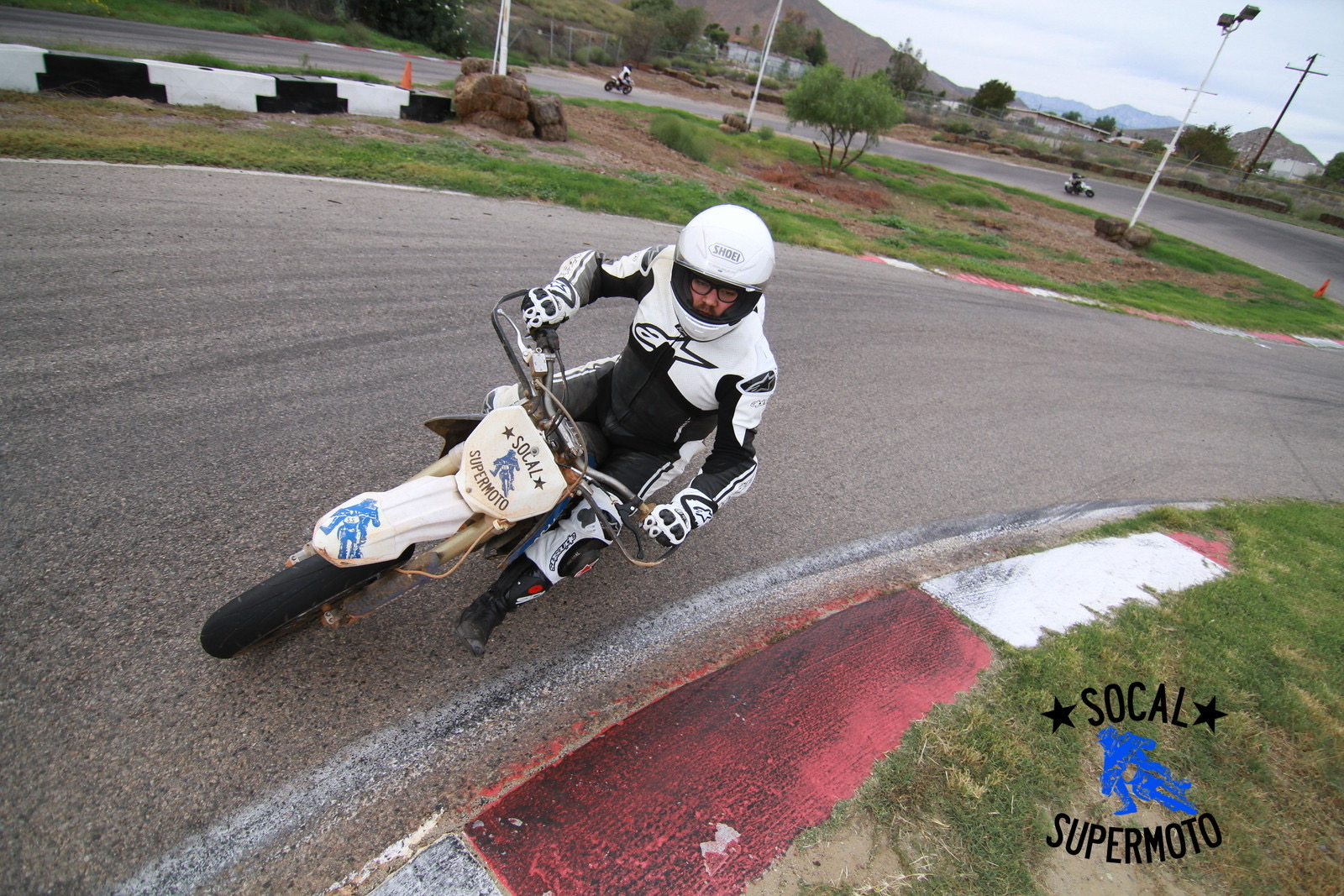 Jonathan riding a supermoto bike at Adams Kart Track