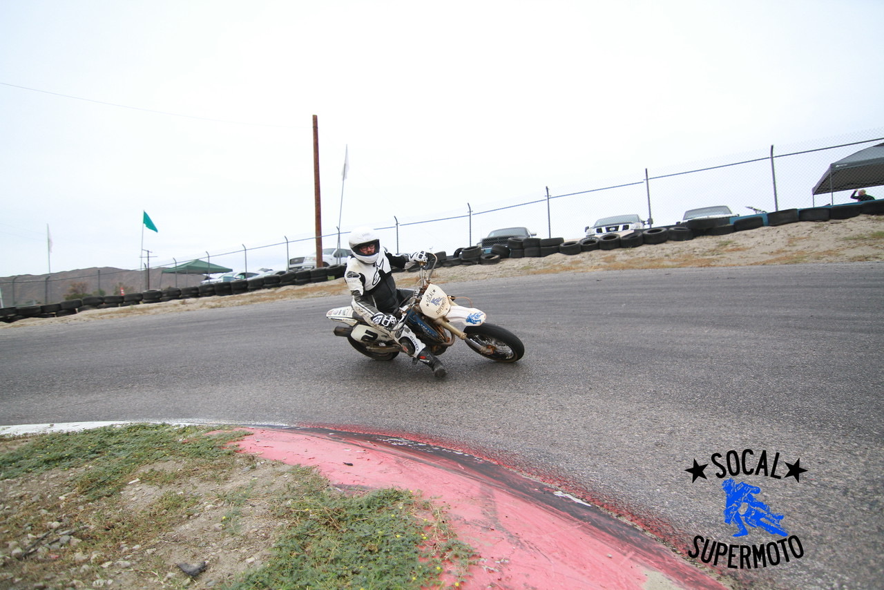 Jonathan riding a supermoto bike at Adams Kart Track
