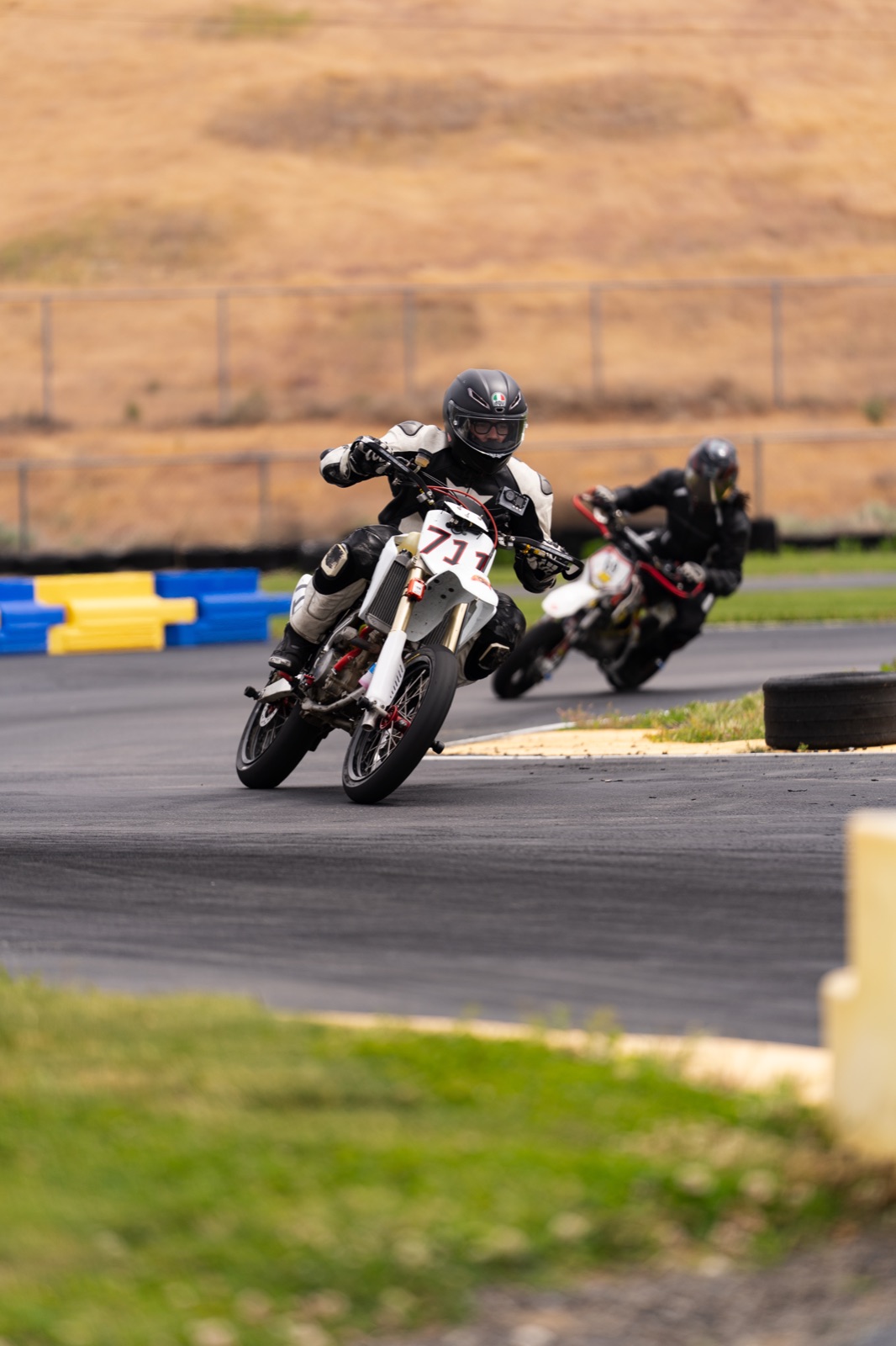 Jonathan Spiva on the Honda CRF150R #711 through a corner (photo 14 of 77)