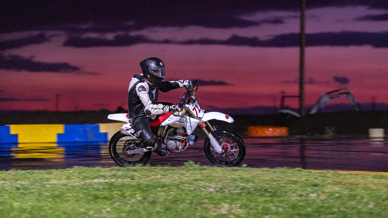 Jonathan Spiva on the #711 under a purple and red sky after sunset (photo 66 of 77)