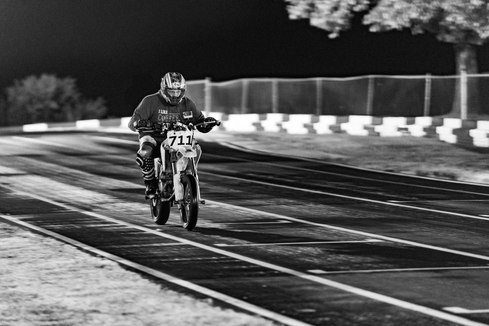 Black and white: the #711 heading down the start-finish straight (photo 71 of 77)