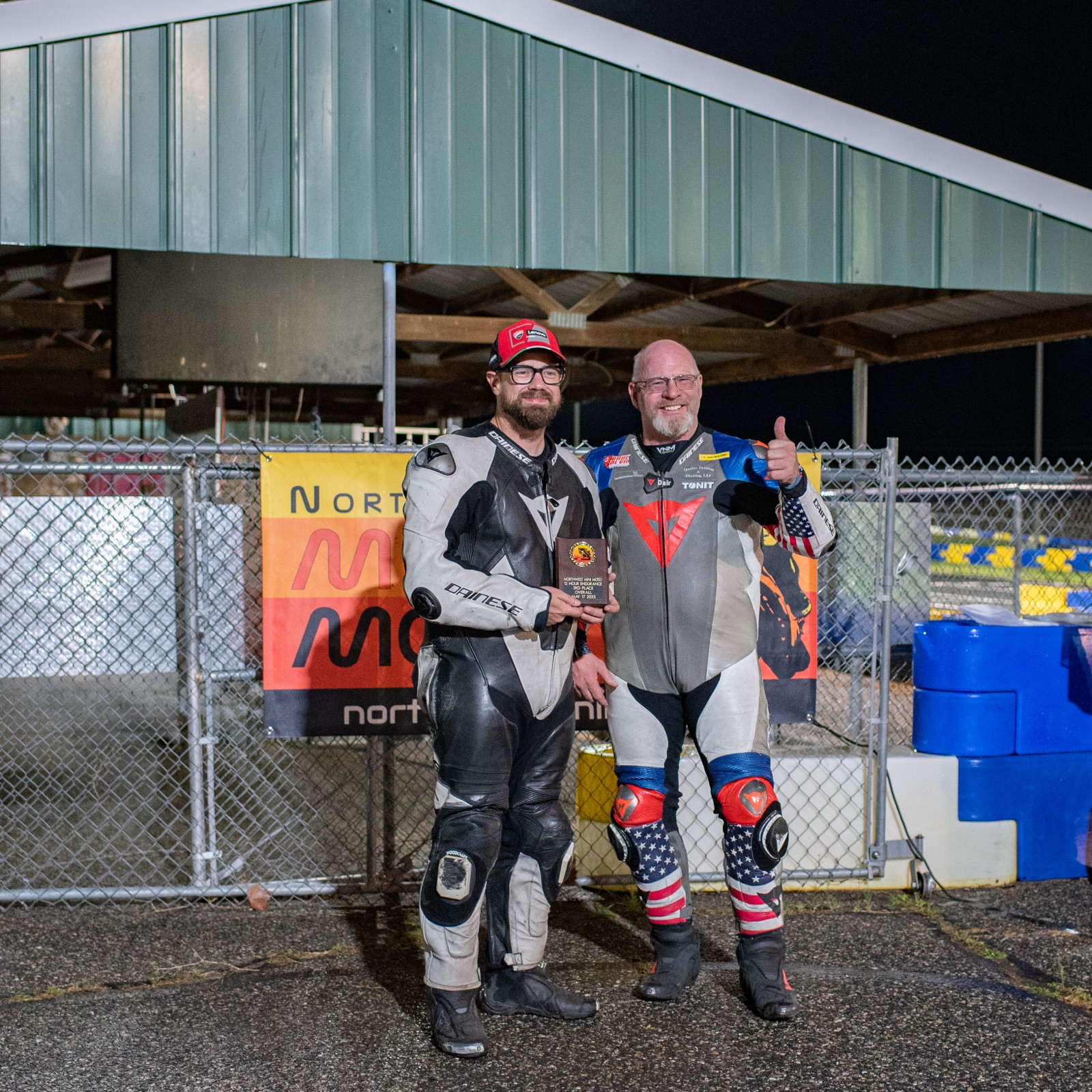 Jonathan Spiva and Matt Higgins with the third place plaque under the pit canopy (photo 77 of 77)