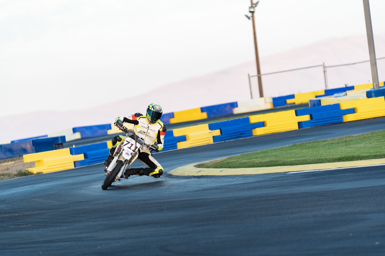 Garrick Fulbright on the #711 through a corner along the barriers on Sunday morning (photo 105 of 117)
