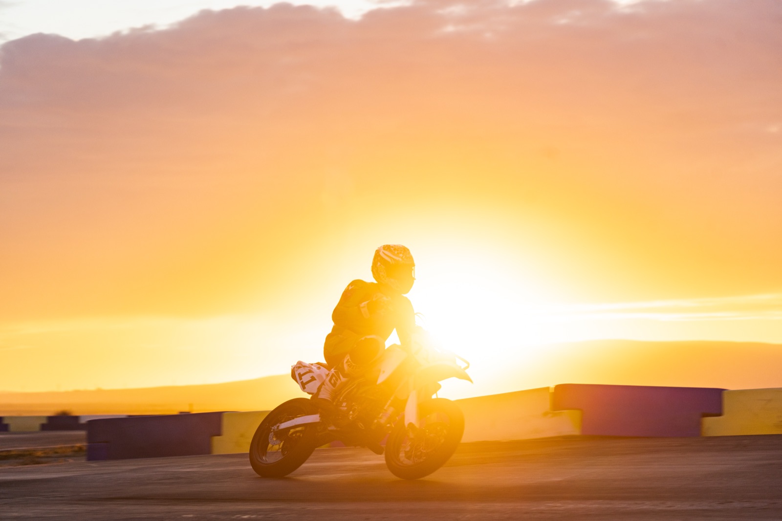 The #711 and its rider backlit by the setting sun (photo 56 of 117)