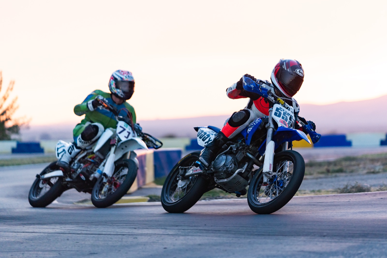 John Gessner on the #711 side by side with a blue bike at sunset (photo 60 of 117)