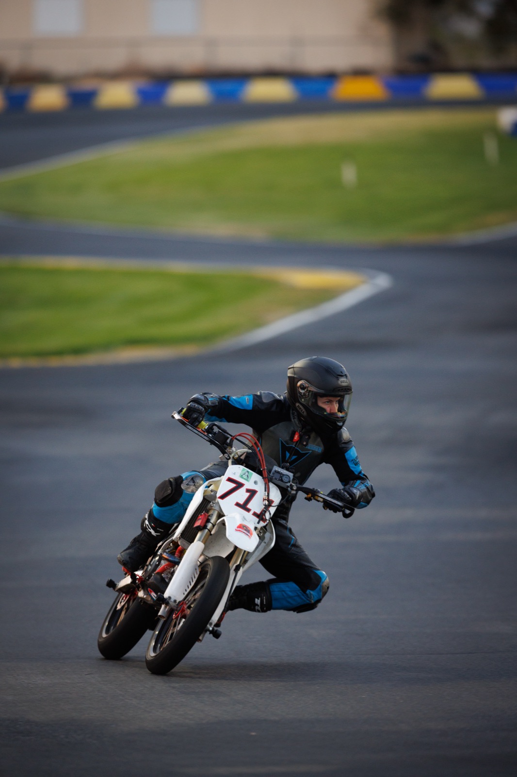 Hannah Johnson leaning the #711 into a corner at first light (photo 74 of 117)