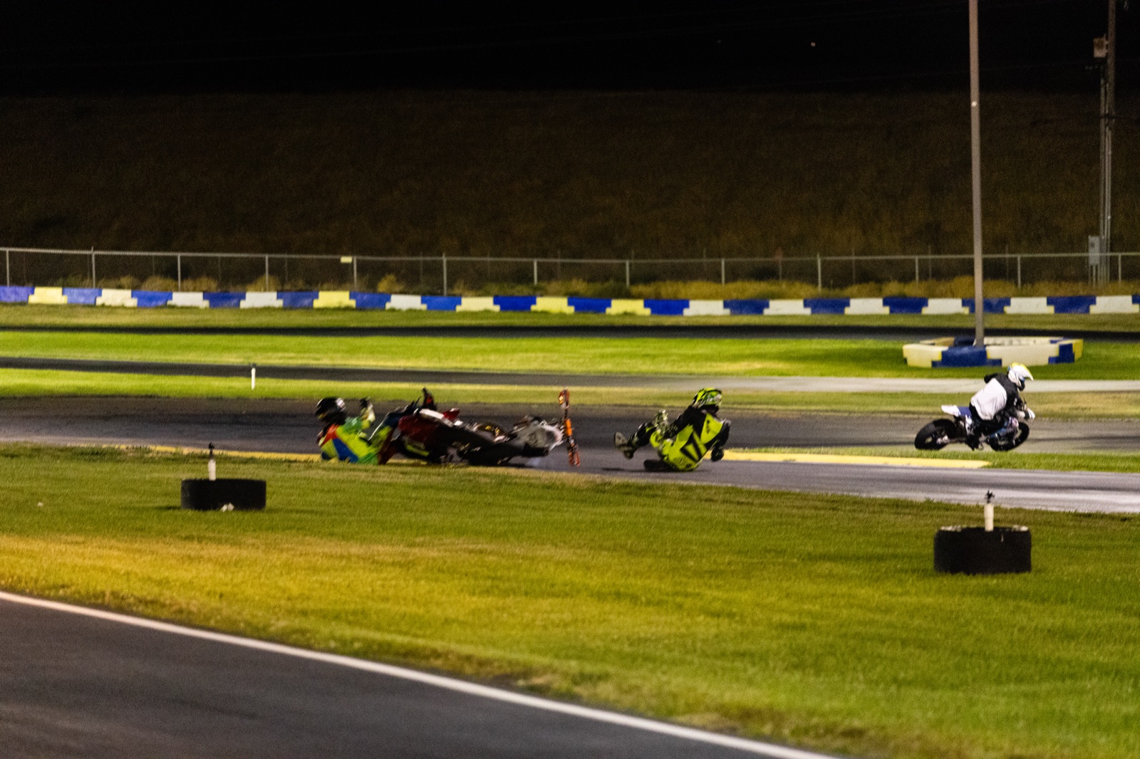 Two bikes down on the track at Tri-City Kart Club, frame 1 of 4 of the incident that ended Jonathan Spiva's night (photo 19 of 22)