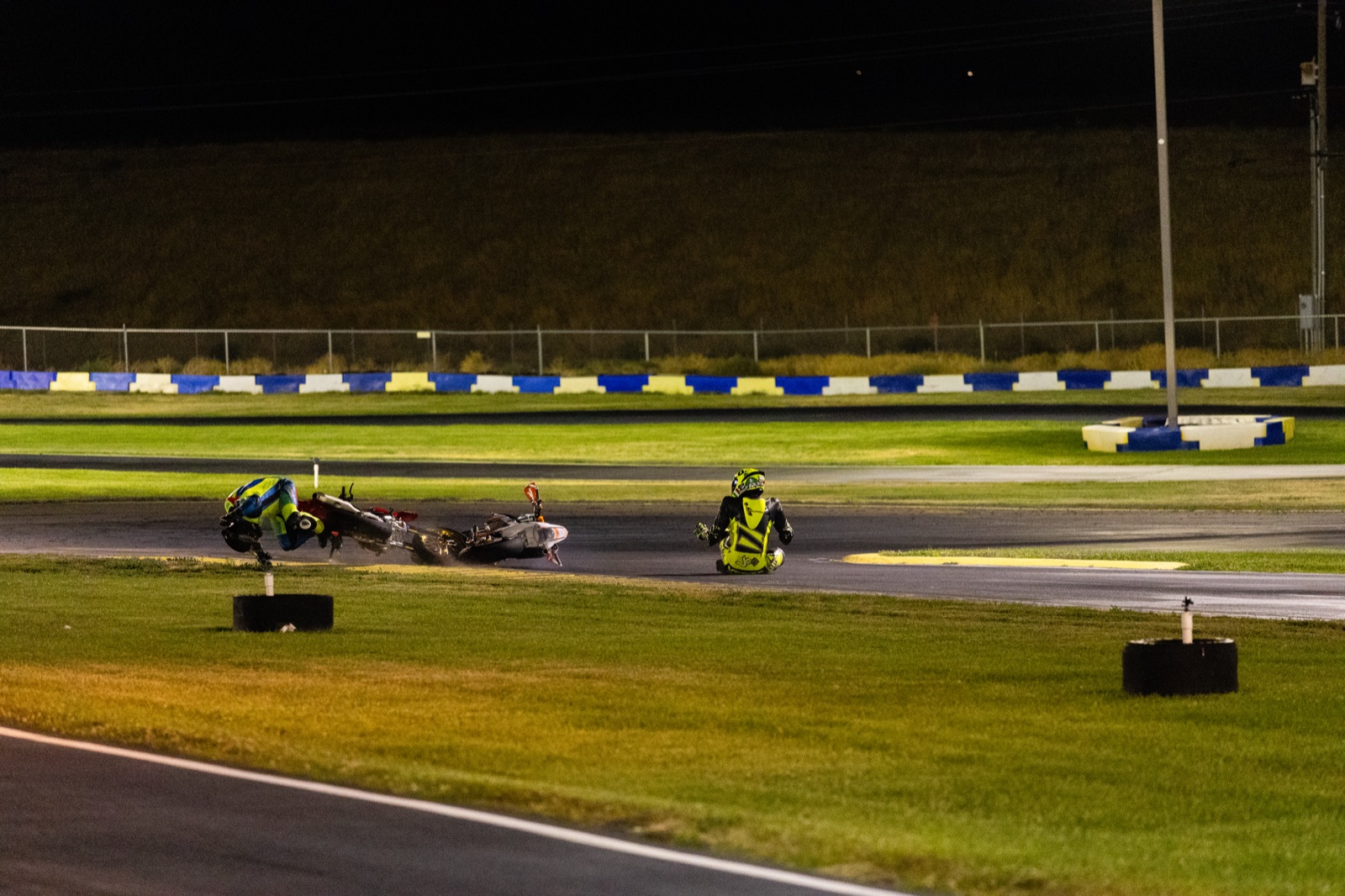 Two bikes down on the track at Tri-City Kart Club, frame 2 of 4 of the incident that ended Jonathan Spiva's night (photo 20 of 22)