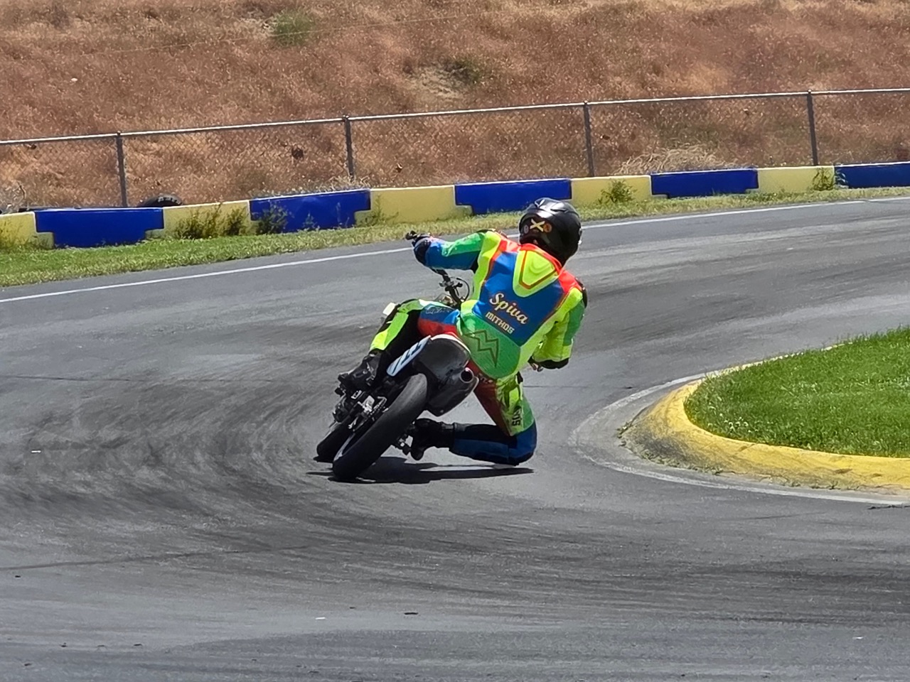 Jonathan Spiva knee down on the Honda CRF150R #711 at TCKC