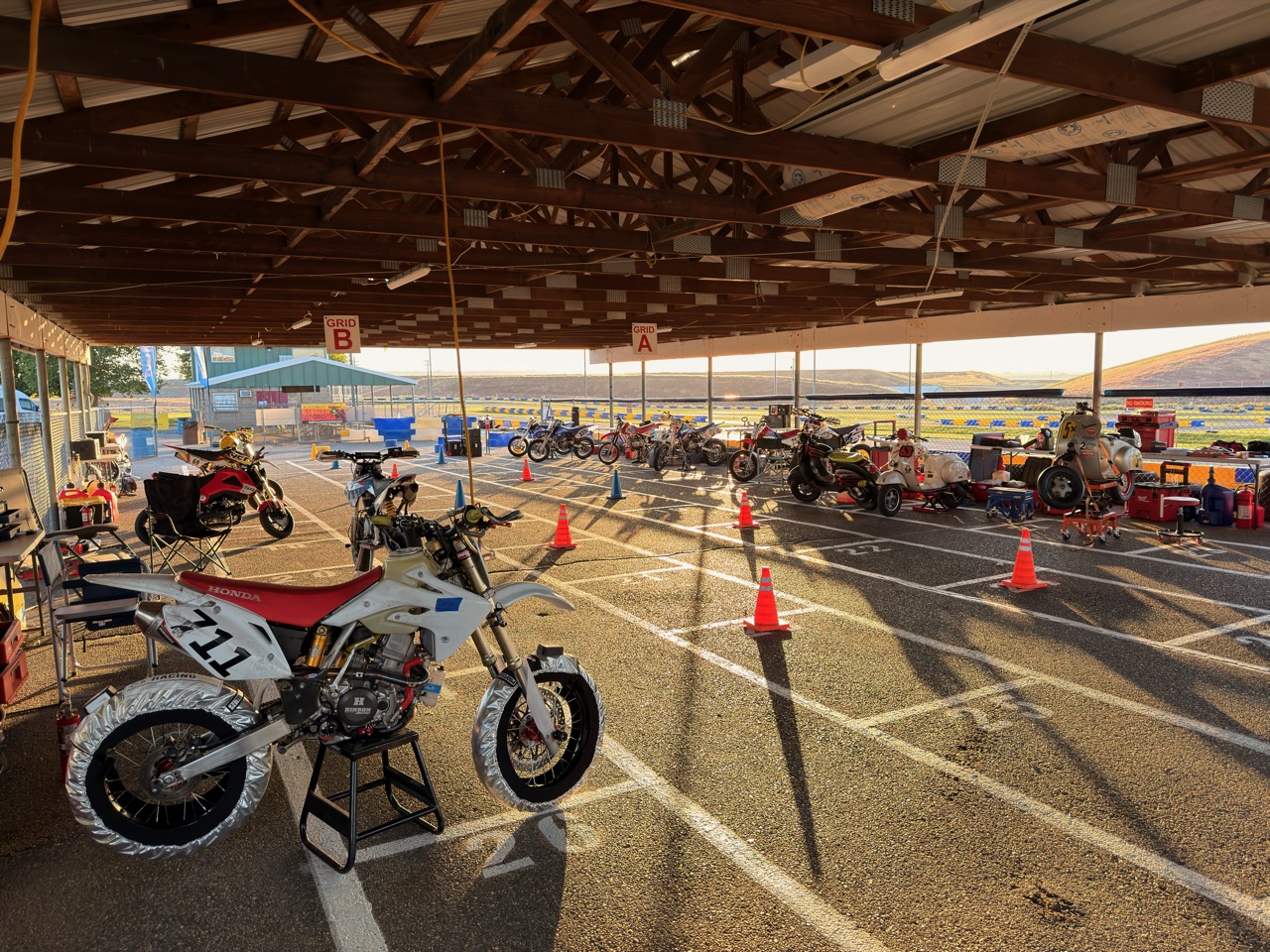 Minimotos lined up in the covered TCKC paddock