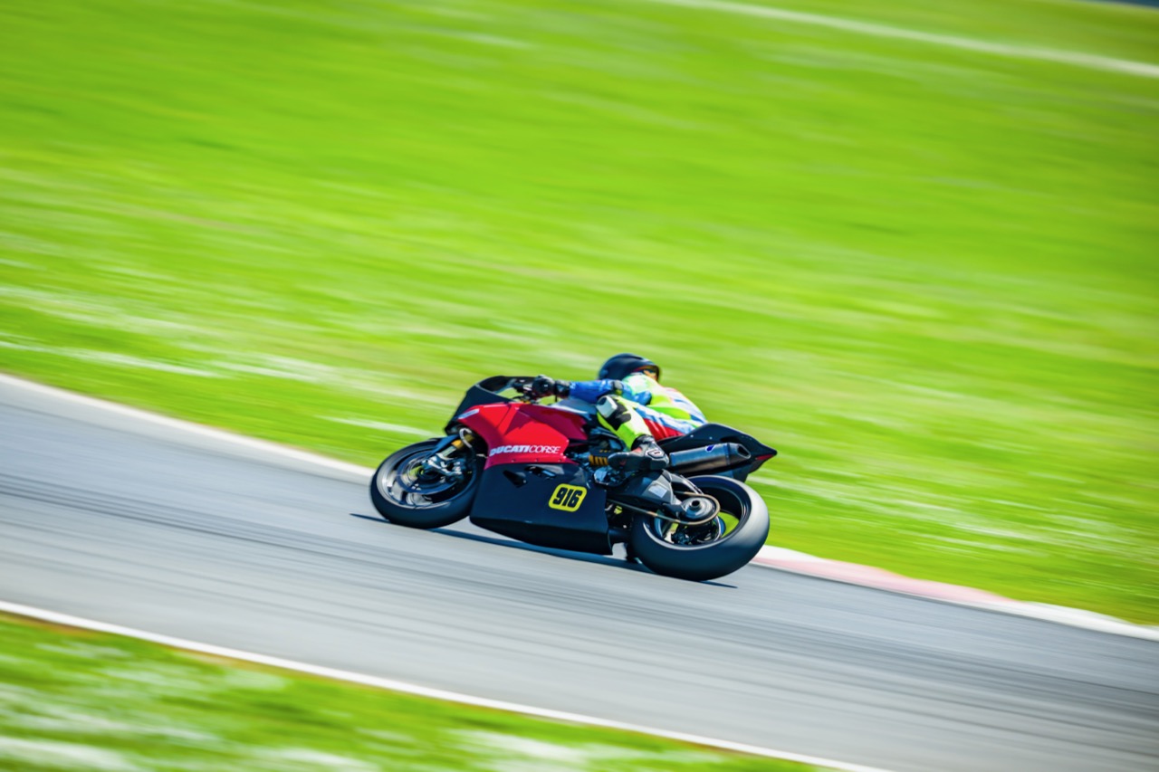 Jonathan Spiva on the #916 Ducati at speed at PIR