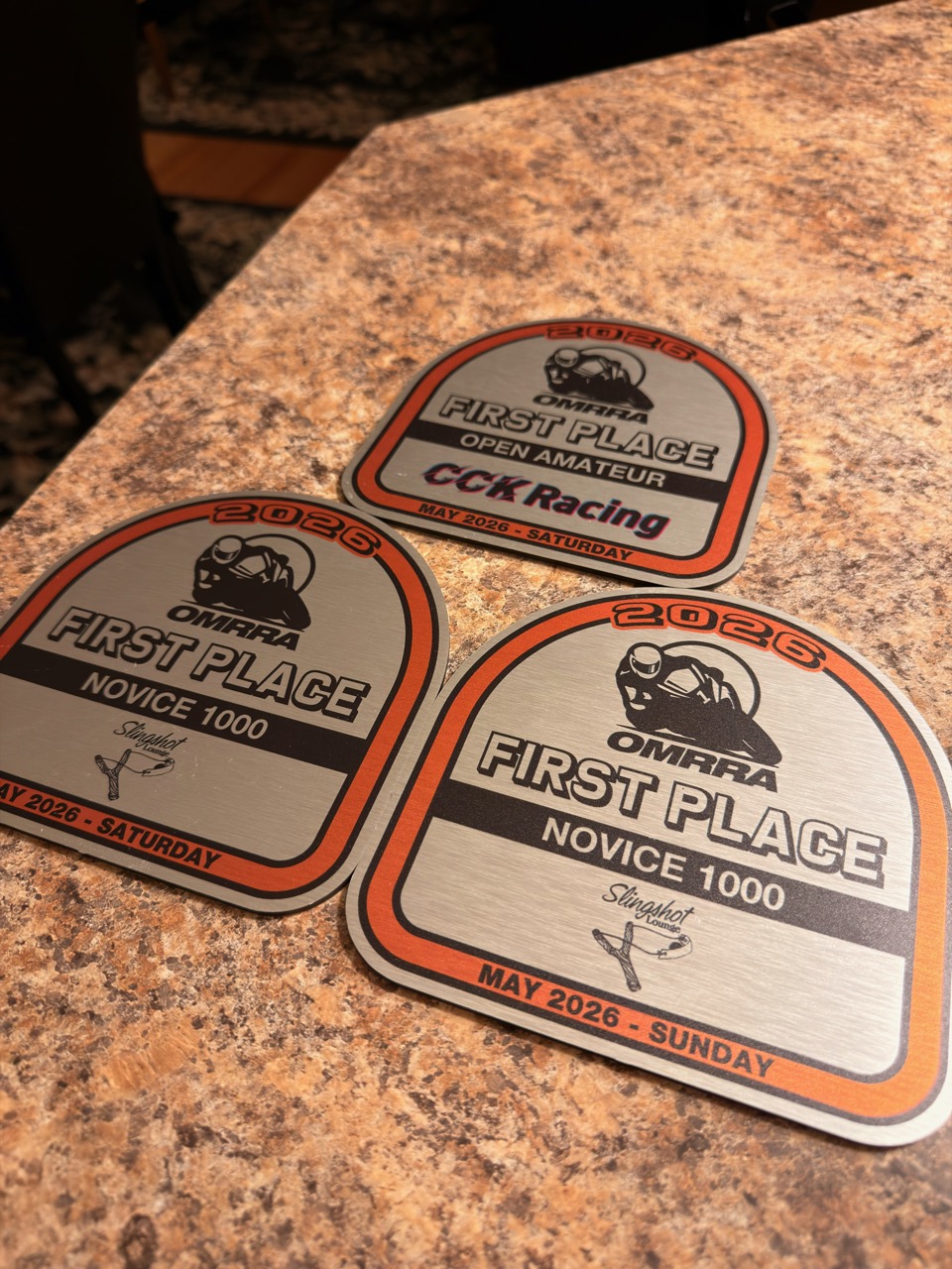 Three OMRRA first-place award plaques from Round 2