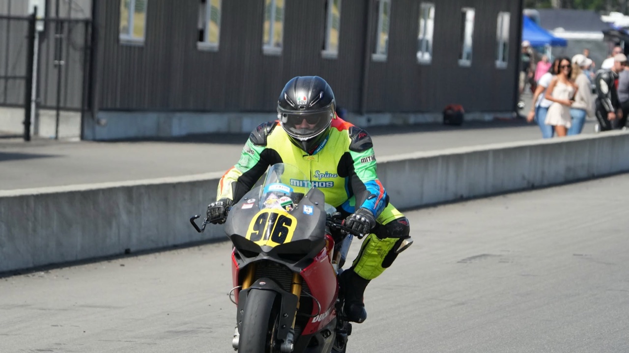 Jonathan Spiva riding the #916 Ducati Panigale R out of the Ridge pit lane