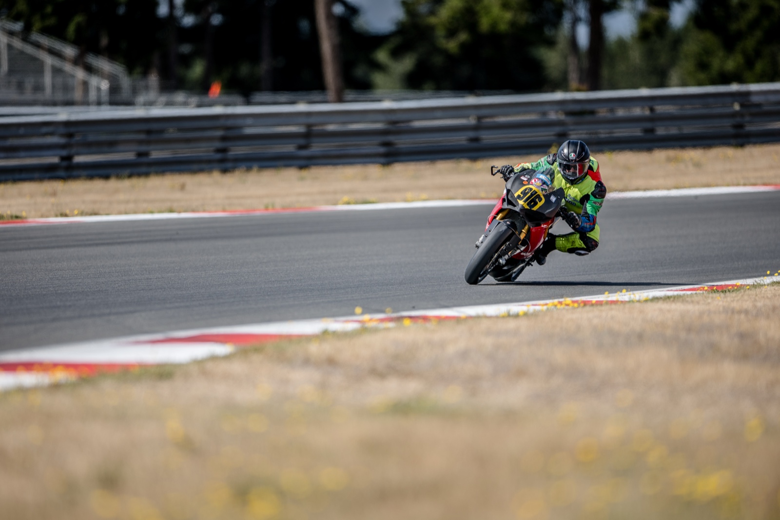 Jonathan Spiva (#916) leaned into a corner on the Ducati Panigale R at The Ridge Motorsports Park