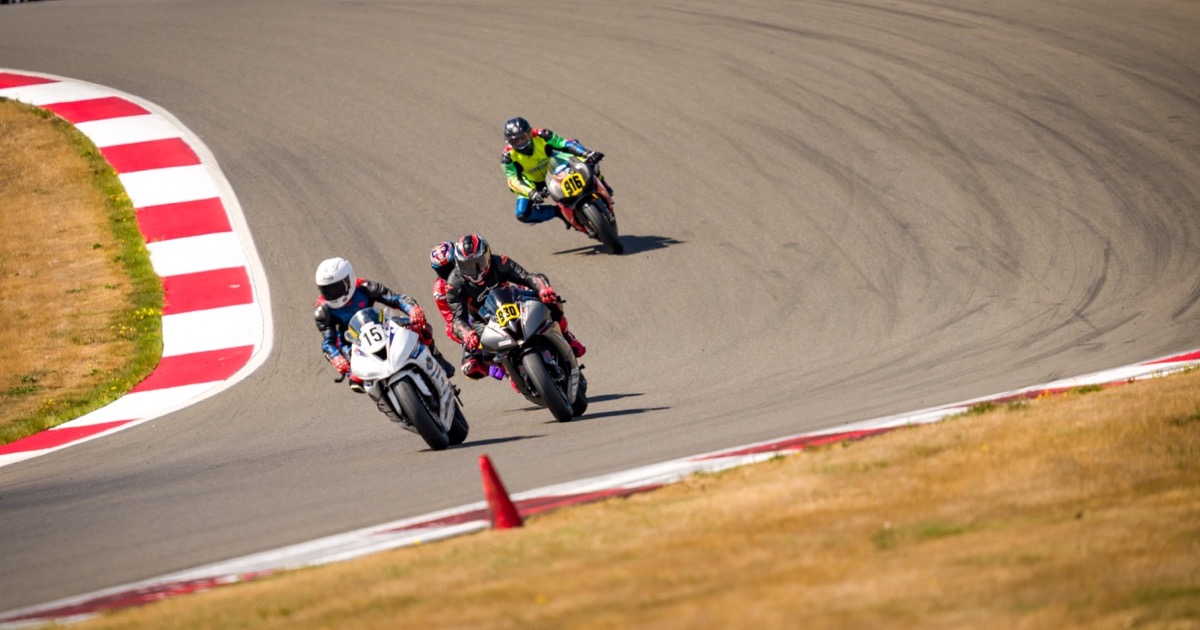 Jonathan Spiva (#916) running behind Jacob Marshall (#15), Steve Schock (#930) and Eric Lin (#997) into Turn 8a at The Ridge during Round 7